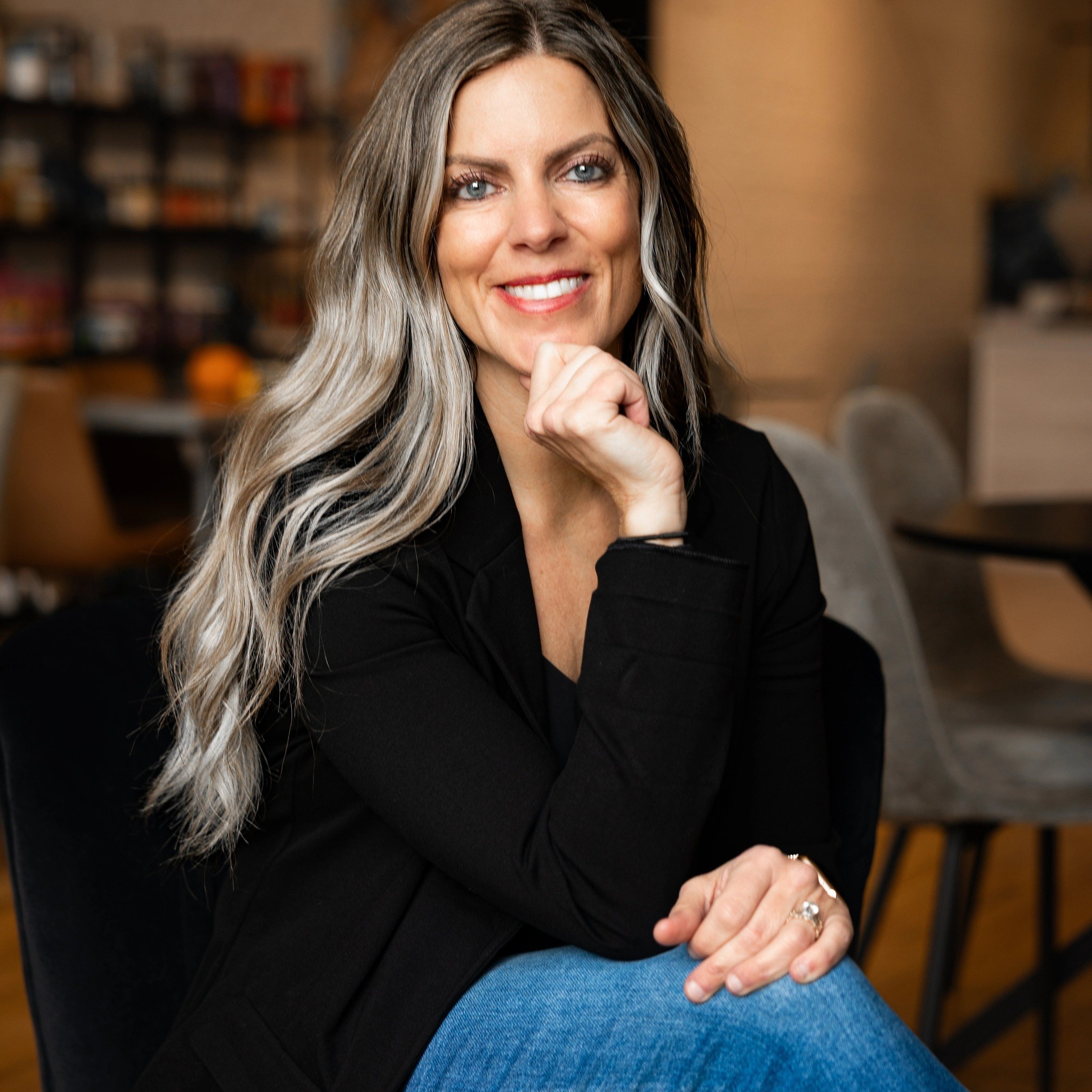 Chelsy, the creative charcuterie artist behind Boardology LLC